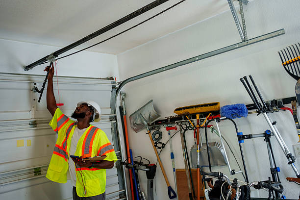 Professional Garage Door Panel Replacement technician working in Westhampton, NY